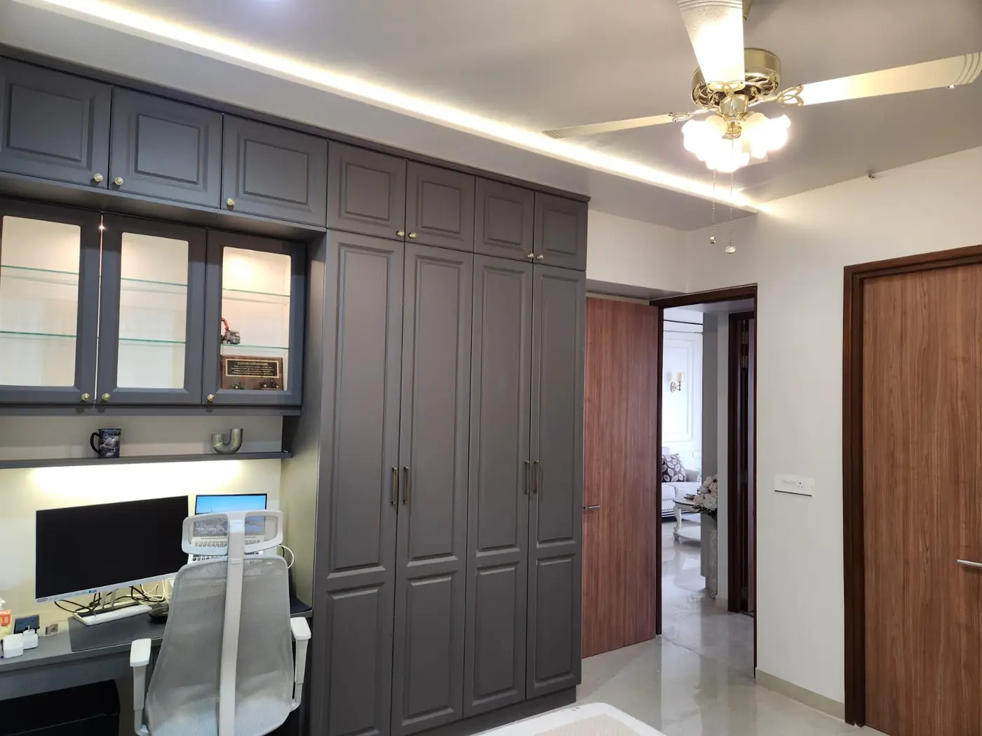 Charcoal grey modular wardrobe with glass top units and study desk, Pune