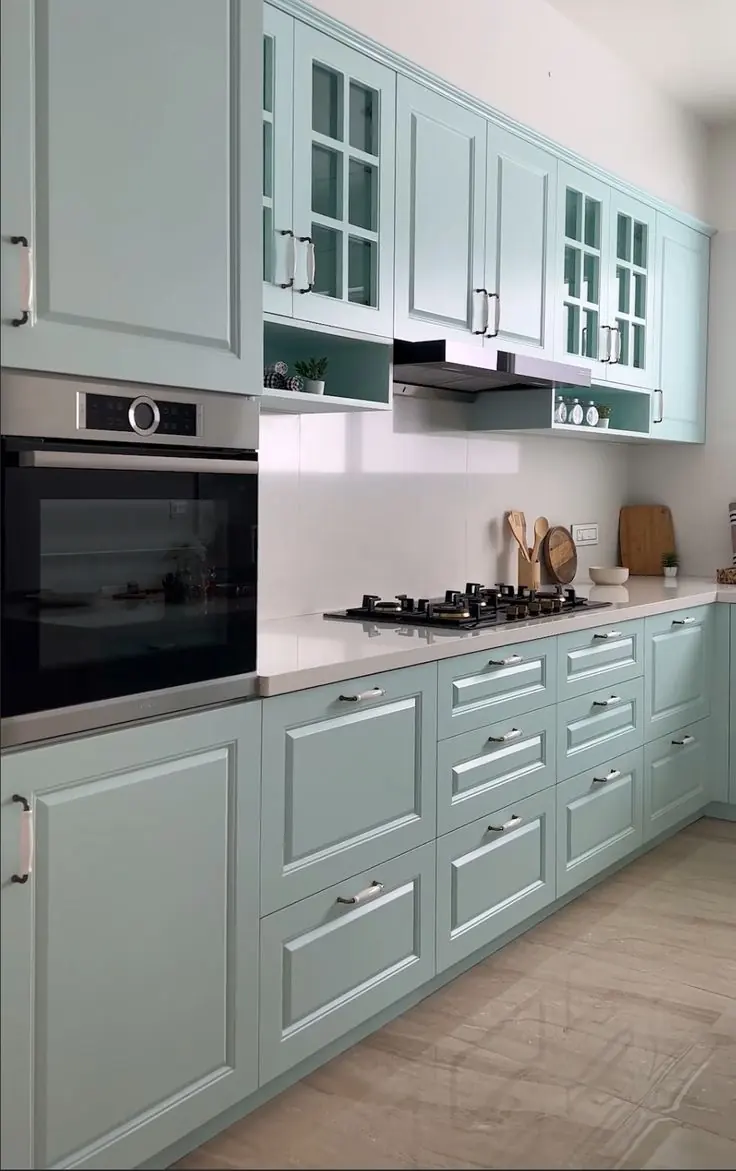 Sage green shaker kitchen with built-in oven – modular design idea